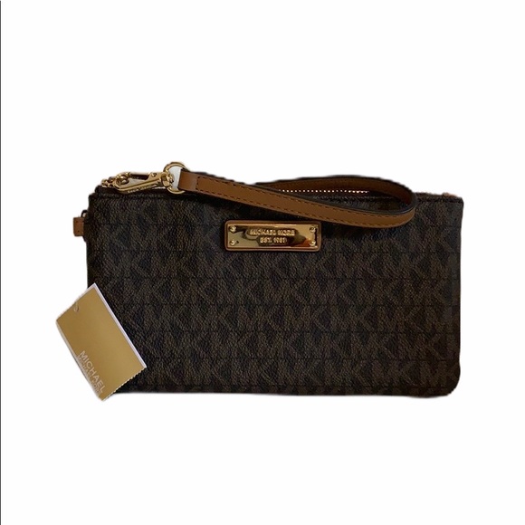Michael Kors Handbags - Michael Kors Jet Set brown medium wristlet NWT